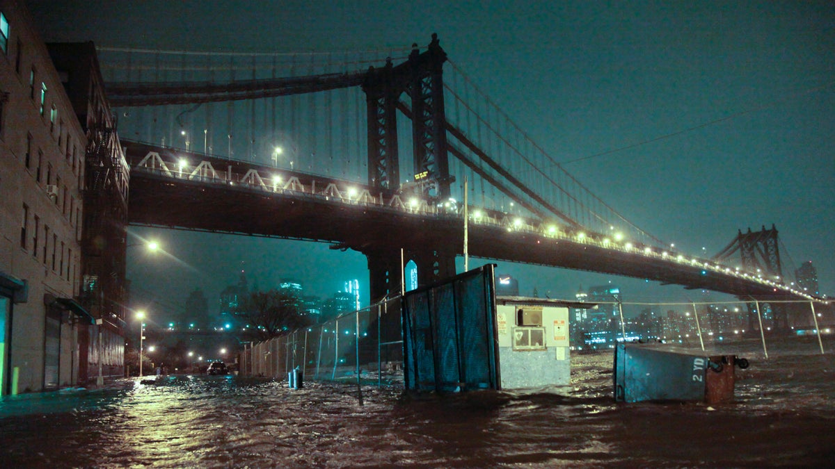  Flooded street under the Manhattan Bridge in Brooklyn, N.Y. on Oct. 29, 2012. (AP Photo/Bebeto Matthews) 