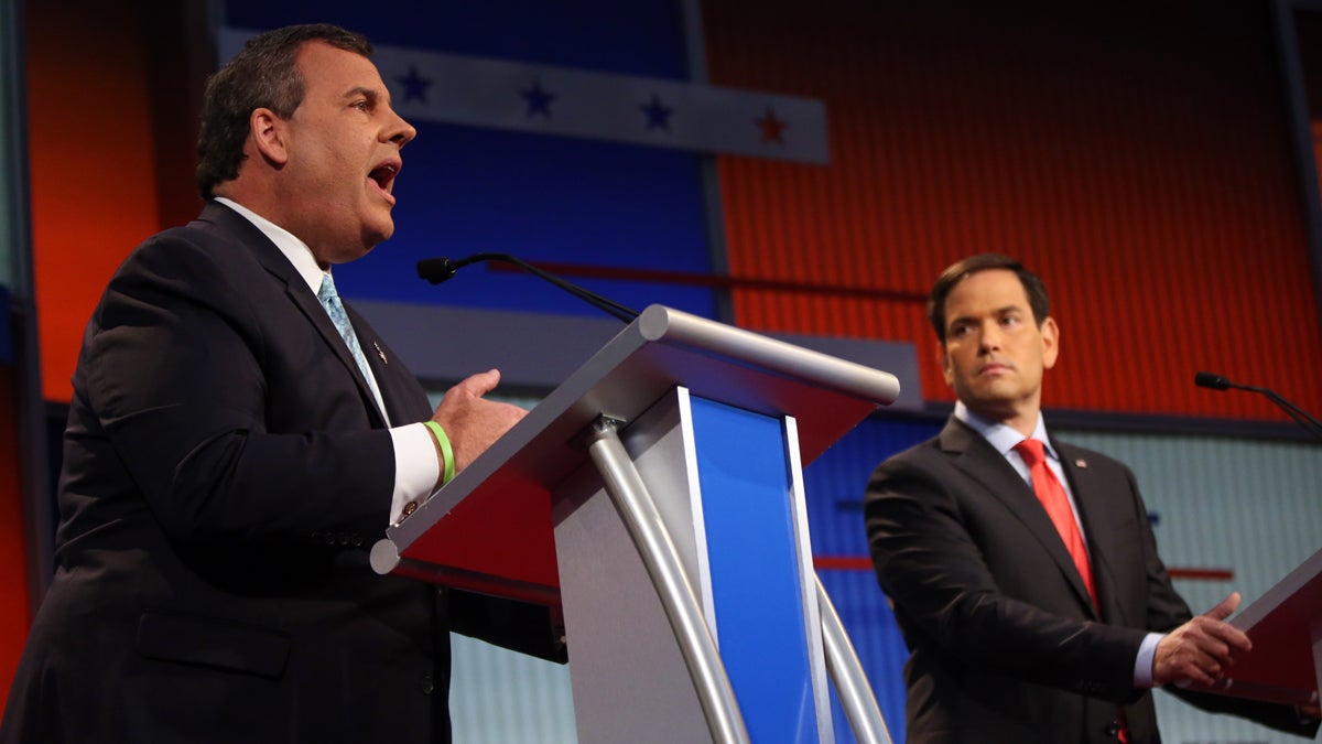  Republican presidential candidate Gov. Chris Christie speaks as Sen. Marco Rubio, R-Fla., listens during the first Republican presidential debate on Aug. 6, 2015, in Cleveland. (AP Photo/Andrew Harnik) 