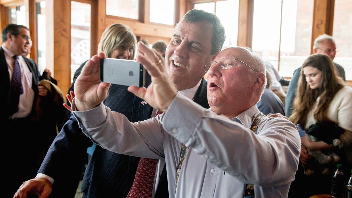  Chris Christie takes a photo with a visitor after speaking at Elly's Tea and Coffee House in Muscatine, Iowa, Tuesday, Dec. 29, 2015. (AP Photo/Andrew Harnik) 