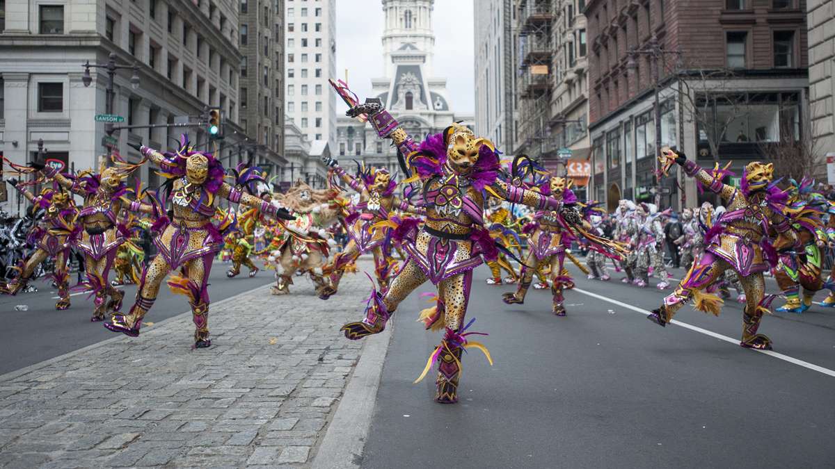 The Satin Slippers Fancy Brigade entertain the crowds on Broad Street (Jonathan Wilson/for NewsWorks)