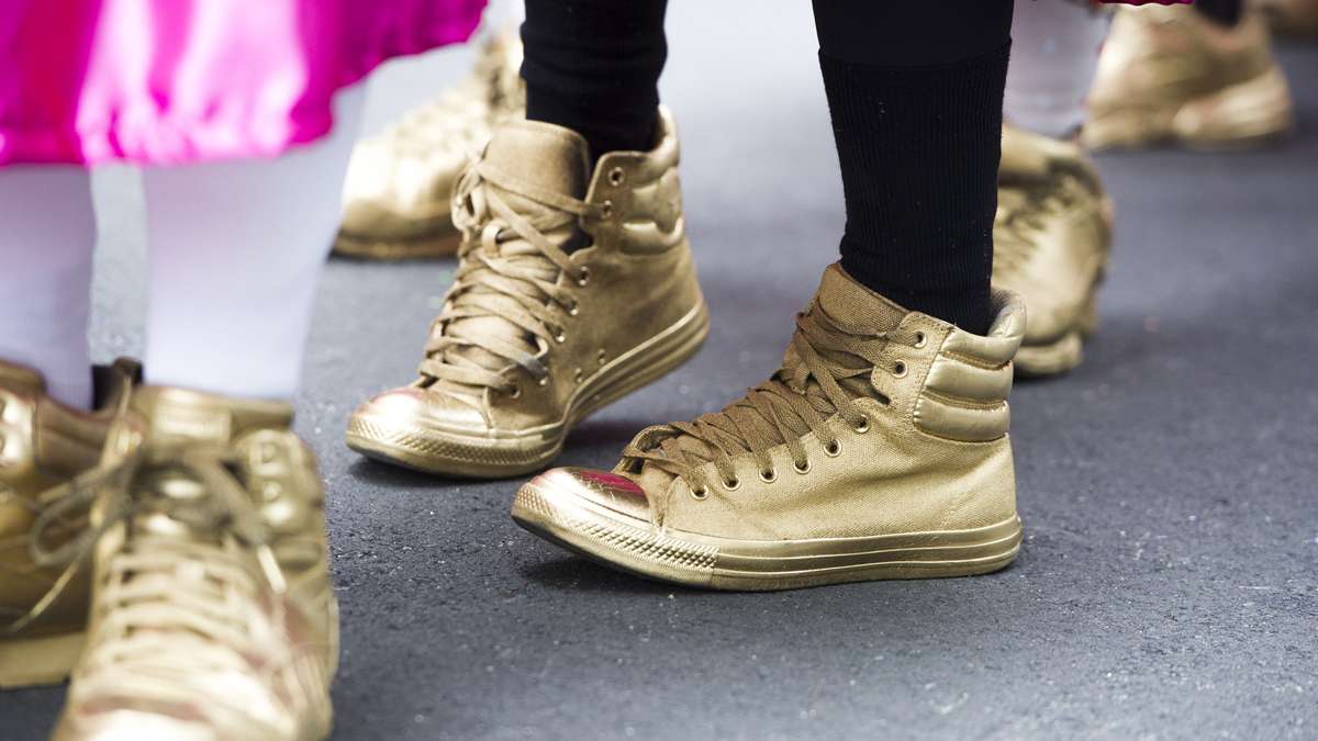Golden ''slippers''  adorned the feet of the Two Street Stompers. (Jonathan Wilson/for NewsWorks)
