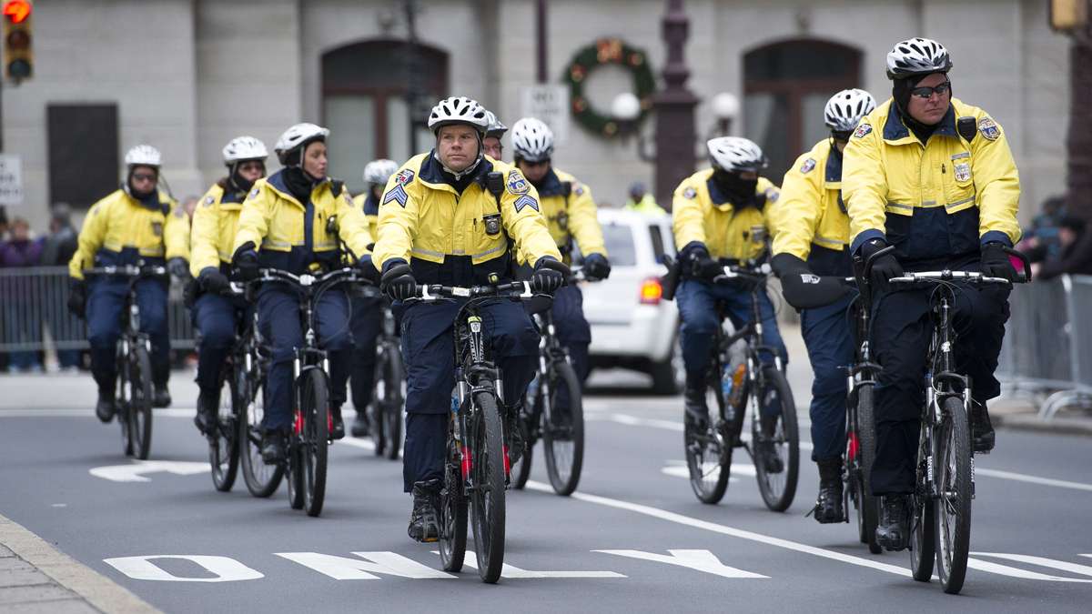 Bicycle police patrolled the parade route before and during the parade. (Jonathan Wilson/for NewsWorks)