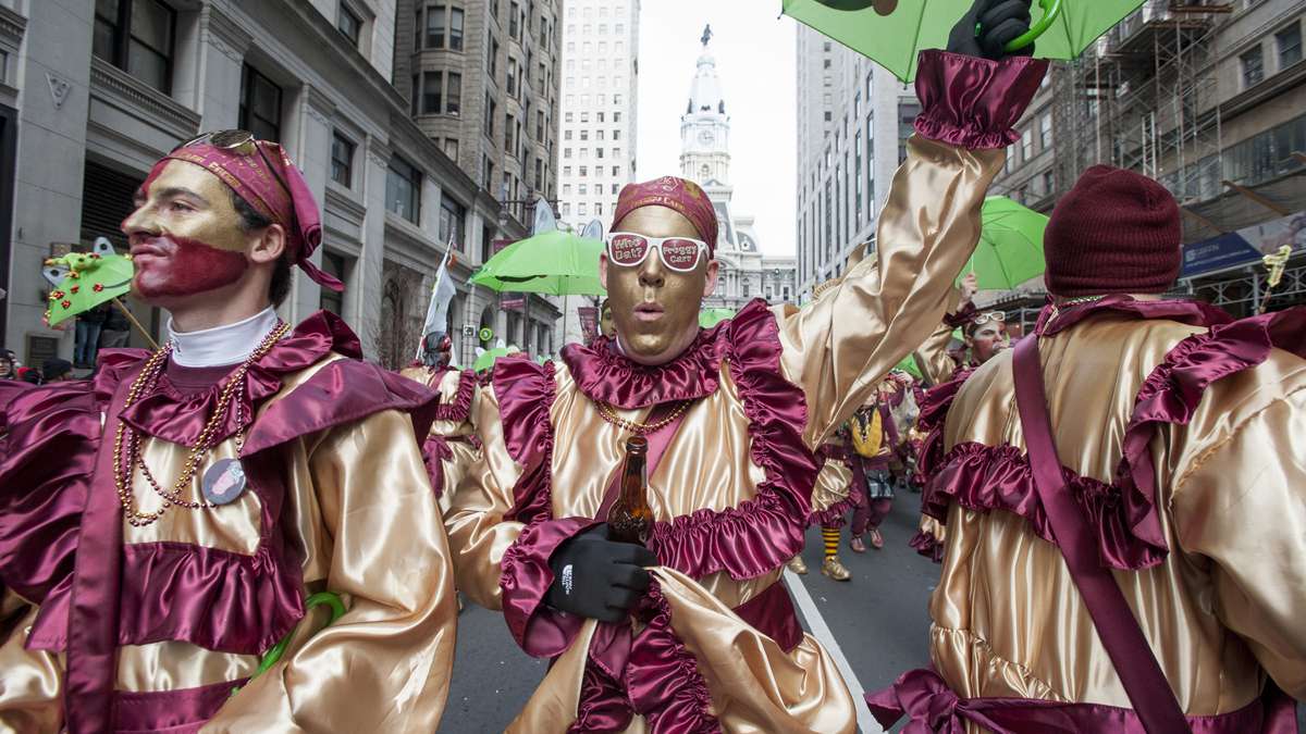 Members of the Froggy Carr Wench Brigade march down Broad Street (Jonathan Wilson/for NewsWorks)