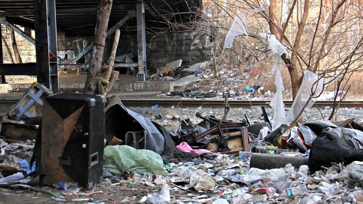  The City of Philadelphia and Conrail will work together to clean and secure the Conrail property in the Fairhill-Kensington neighborhood long used as a campground for drug addicts. (Emma Lee/WHYY) 