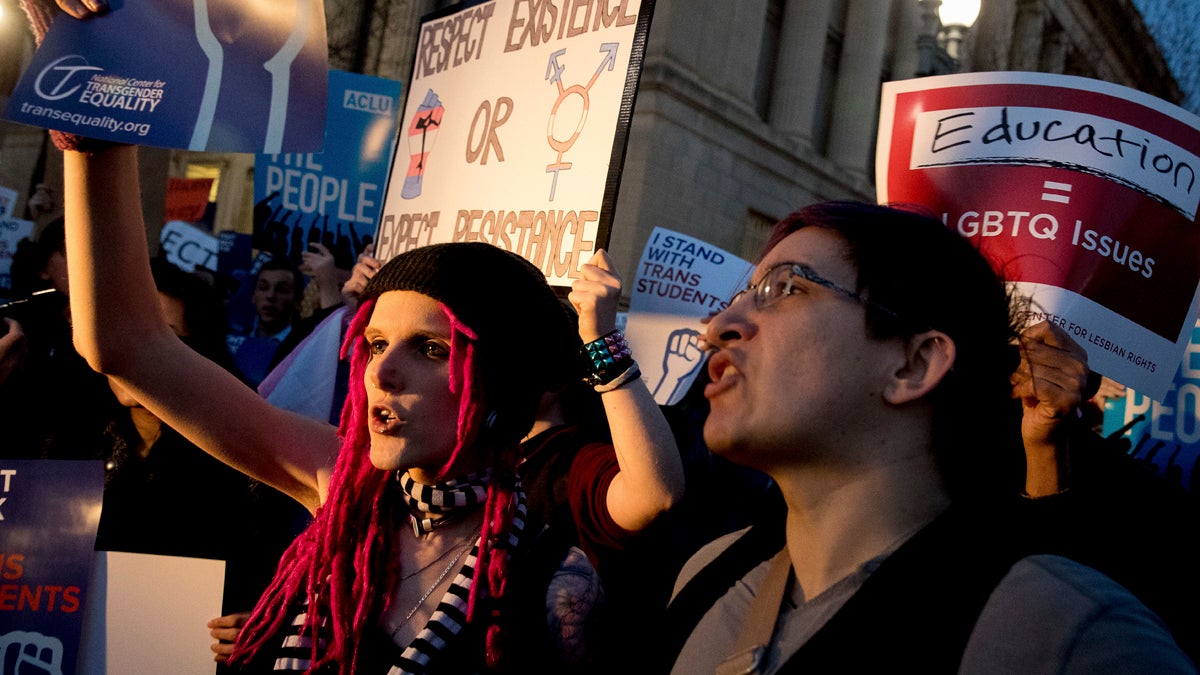  Activists and protesters with the National Center for Transgender Equality rally in front of the White House, Wednesday, Feb. 22, 2017, in Washington, after the Department of Education and the Justice Department announce plans to overturn the school guidance on protecting transgender students. (AP Photo/Andrew Harnik) 