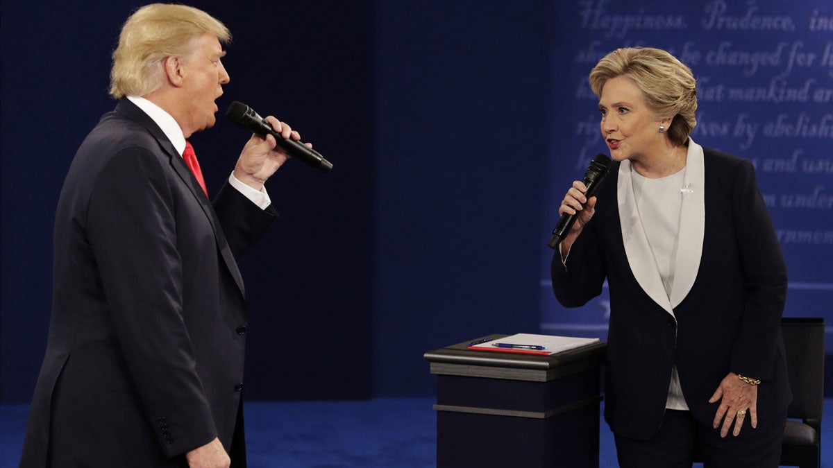  Republican presidential nominee Donald Trump and Democratic presidential nominee Hillary Clinton speak during the second presidential debate last year at Washington University in St. Louis. Your political beliefs may be influencing your perception. (AP file photo) 