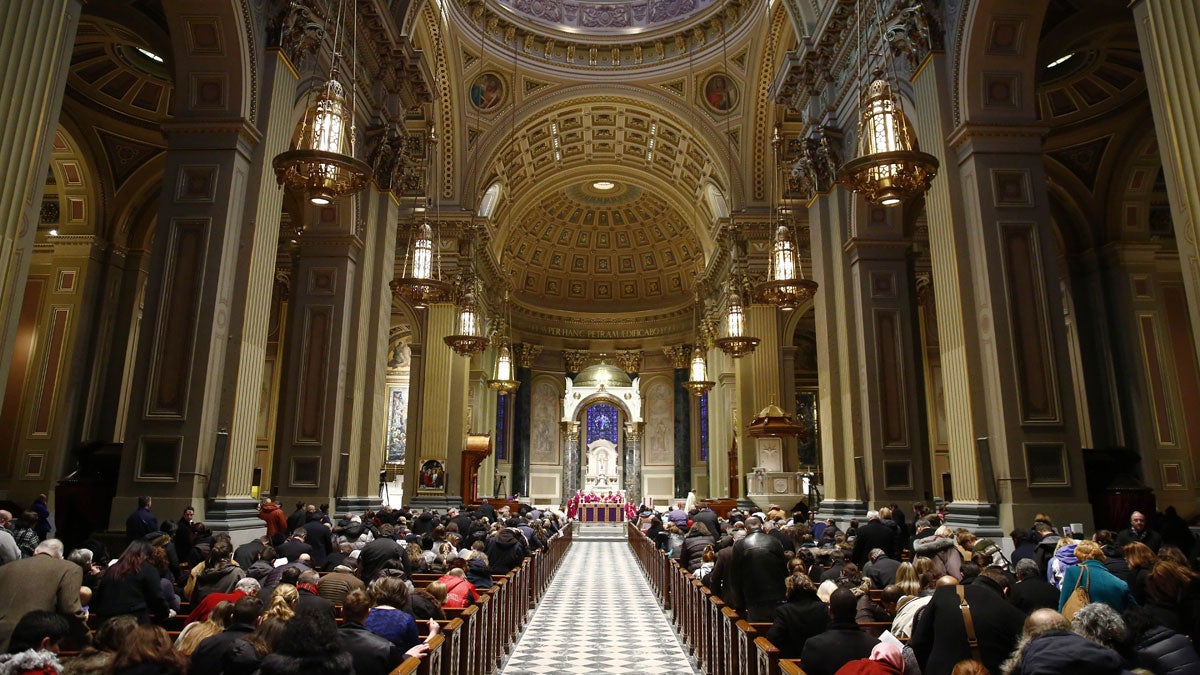 Archbishop of Philadelphia Charles Chaput, center, celebrates Ash Wednesday Mass at the Cathedral Basilica of Saints Peter and Paul in Philadelphia on Wednesday, Feb. 18, 2015.  (AP File Photo/Matt Rourke) 