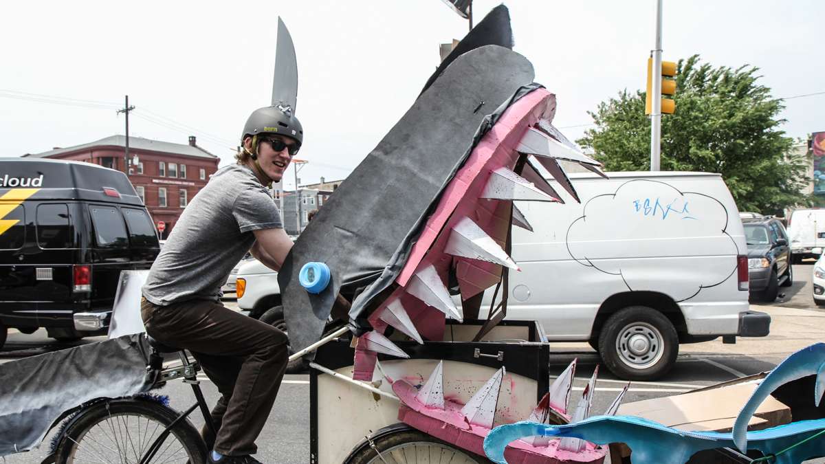 A shark bike cruises the Kensington Kinetic Sculpture Derby and Arts Festival. (Kimberly Paynter/WHYY)