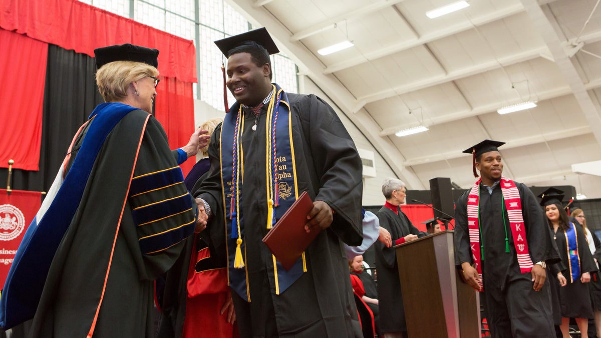  Students accept their diplomas at the 2016 spring commencement at East Stroudsburg University. The school has succeeded in narrowing the graduation gap between black and white students while boosting minority enrollment. (East Stroudsburg University) 