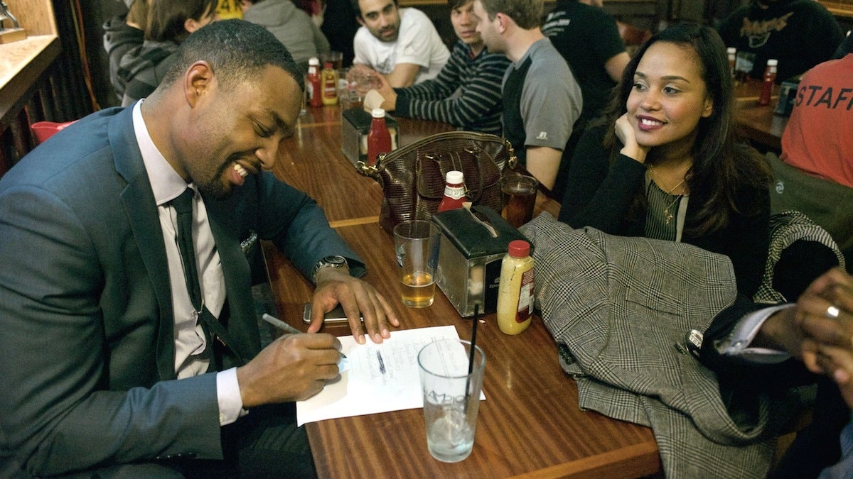 Mayoral candidate Doug Oliver plays a round of Quizzo at Bill Murphy's Irish Bar in East Falls. (Bas Slabbers/for NewsWorks)