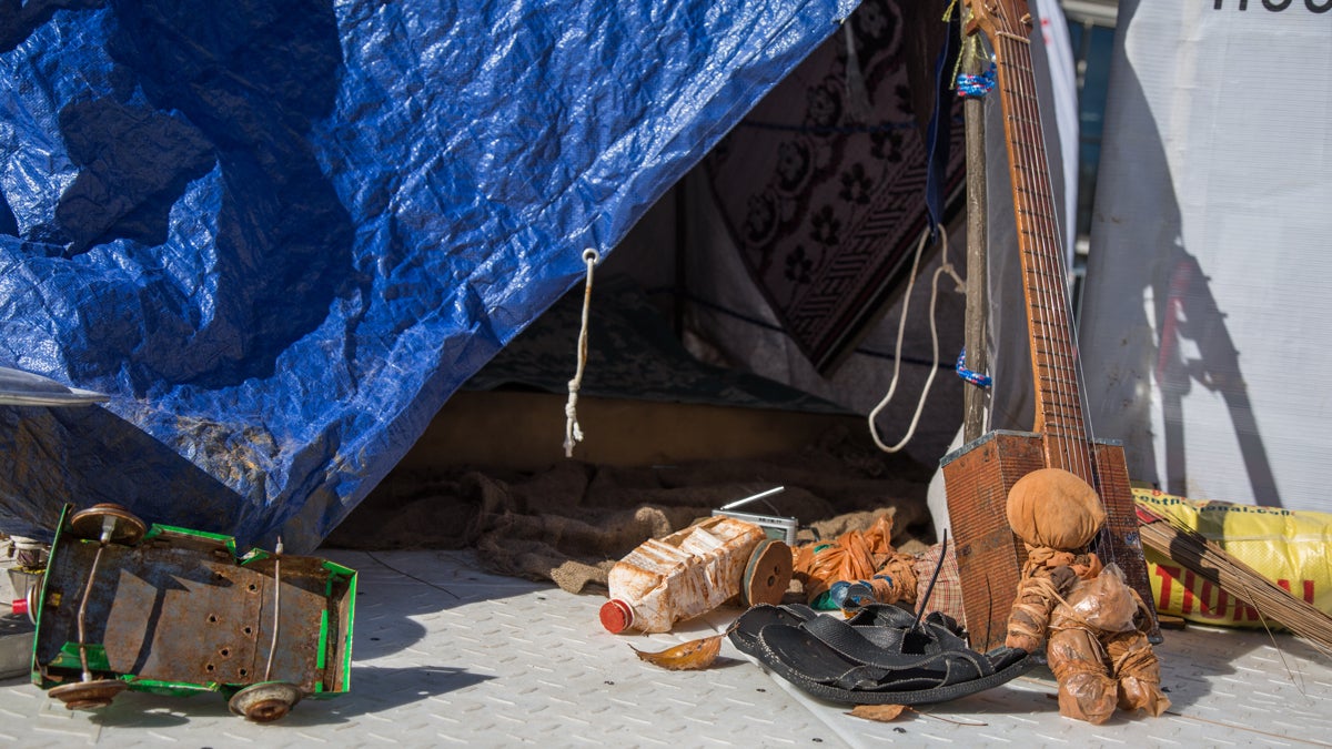 A makeshift tent contains a migrant familiy's few posessions. (Emily Cohen for NewsWorks)