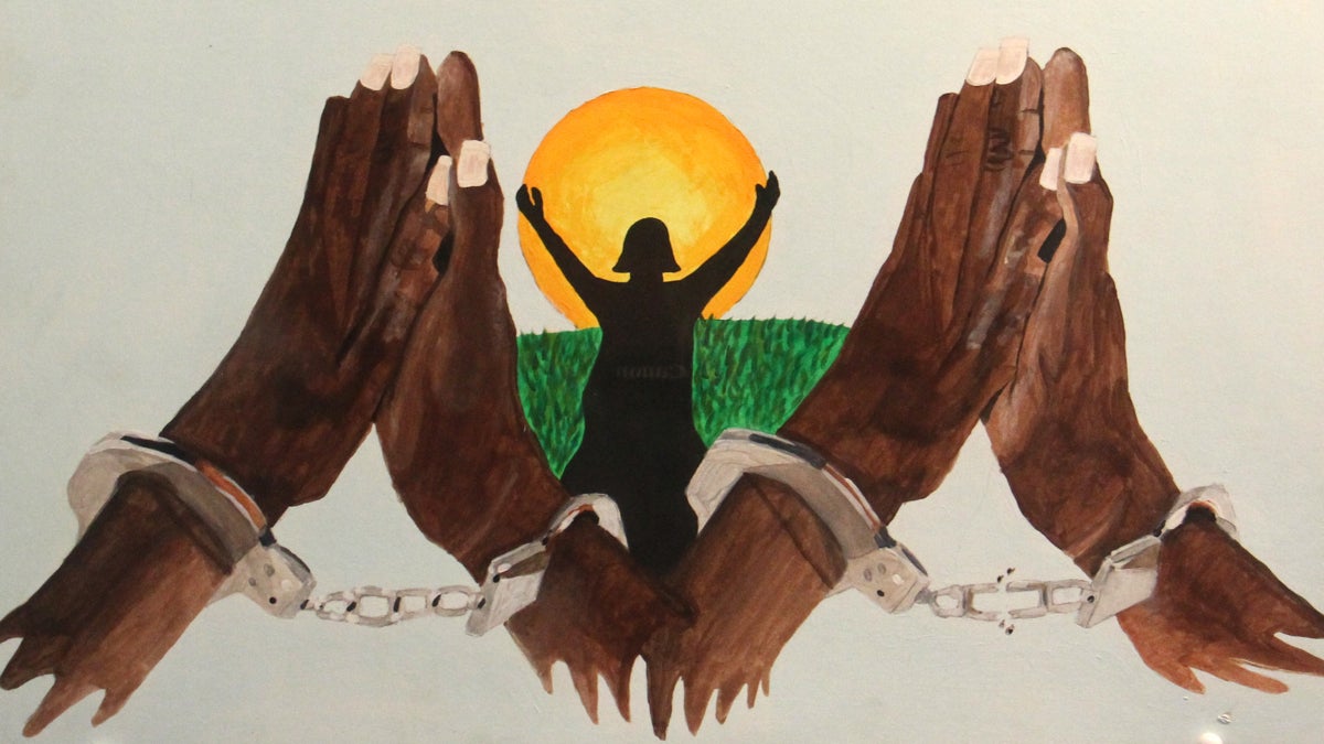 Enid Pagan's ''Praying Hands Breaking Free.'' (Emma Lee/WHYY)
