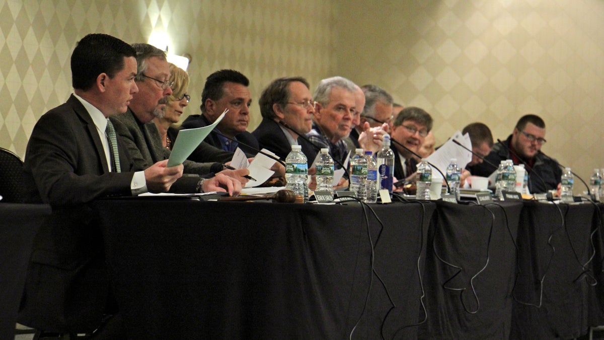  Members of the New Jersey Pinelands Commission preside over a public hearing in Cherry Hill. (Emma Lee/WHYY, file) 