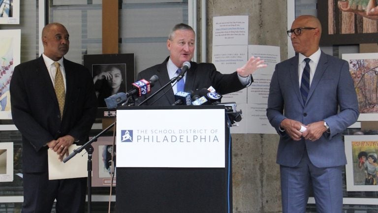 image-uploaded-from-ios-12 Philadelphia Mayor Jim Kenney announces a program that will put trained social workers in public schools to help students deal with trauma. He is joined by Commissioner of the Philadelphia Department of Behavioral Health David T. Jones (left) and Philadelphia schools Superintendent William Hite. (Emma Lee/WHYY)