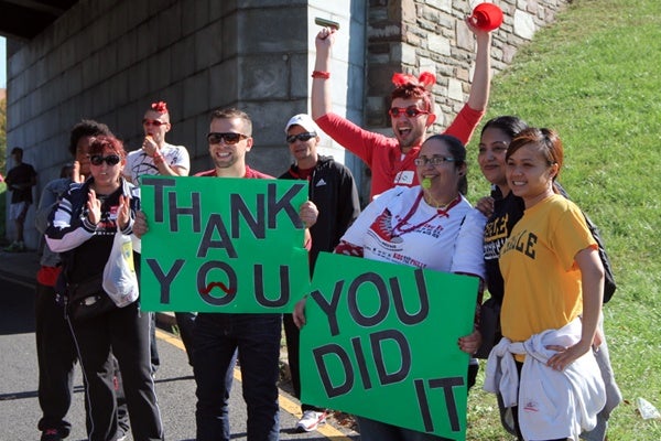 <p><p>Cheerleaders congratulate walkers at the finish line of the Philadelphia AIDS Walk, Oct. 21, 2012. (Marta Rusek/for NewsWorks)</p></p>
