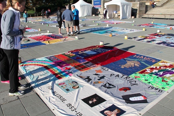 <p><p>Walkers observe sections of the AIDS quilt at AIDS Walk Philly, Oct. 21, 2012. (Marta Rusek/for NewsWorks)</p></p>
