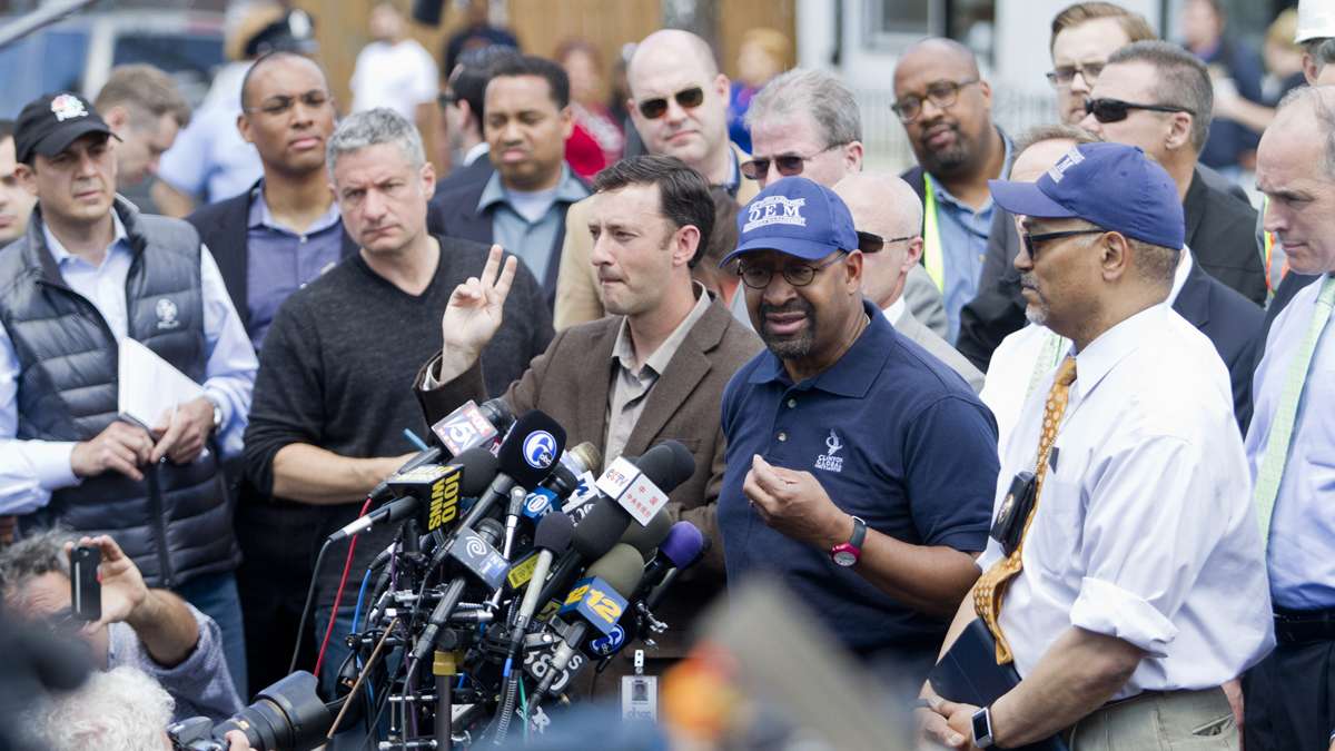 Mayor Nutter updates the press Wednesday afternoon at Frankford Avenue and Wheatsheaf Lane near the crash site of the derailed Amtrak train that killed seven passengers last night.