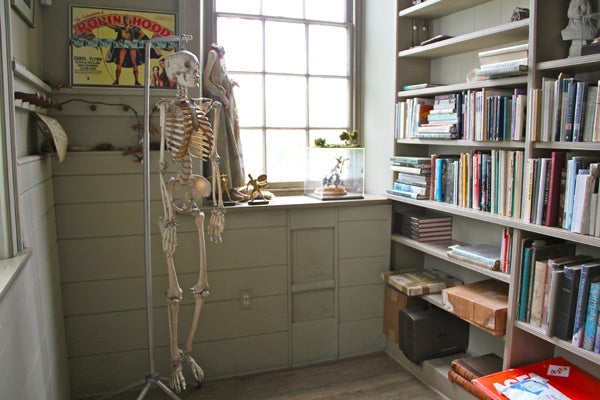 A human skeleton and a headless doll are part of the decor of the Wyeth library. (Emma Lee/for NewsWorks)