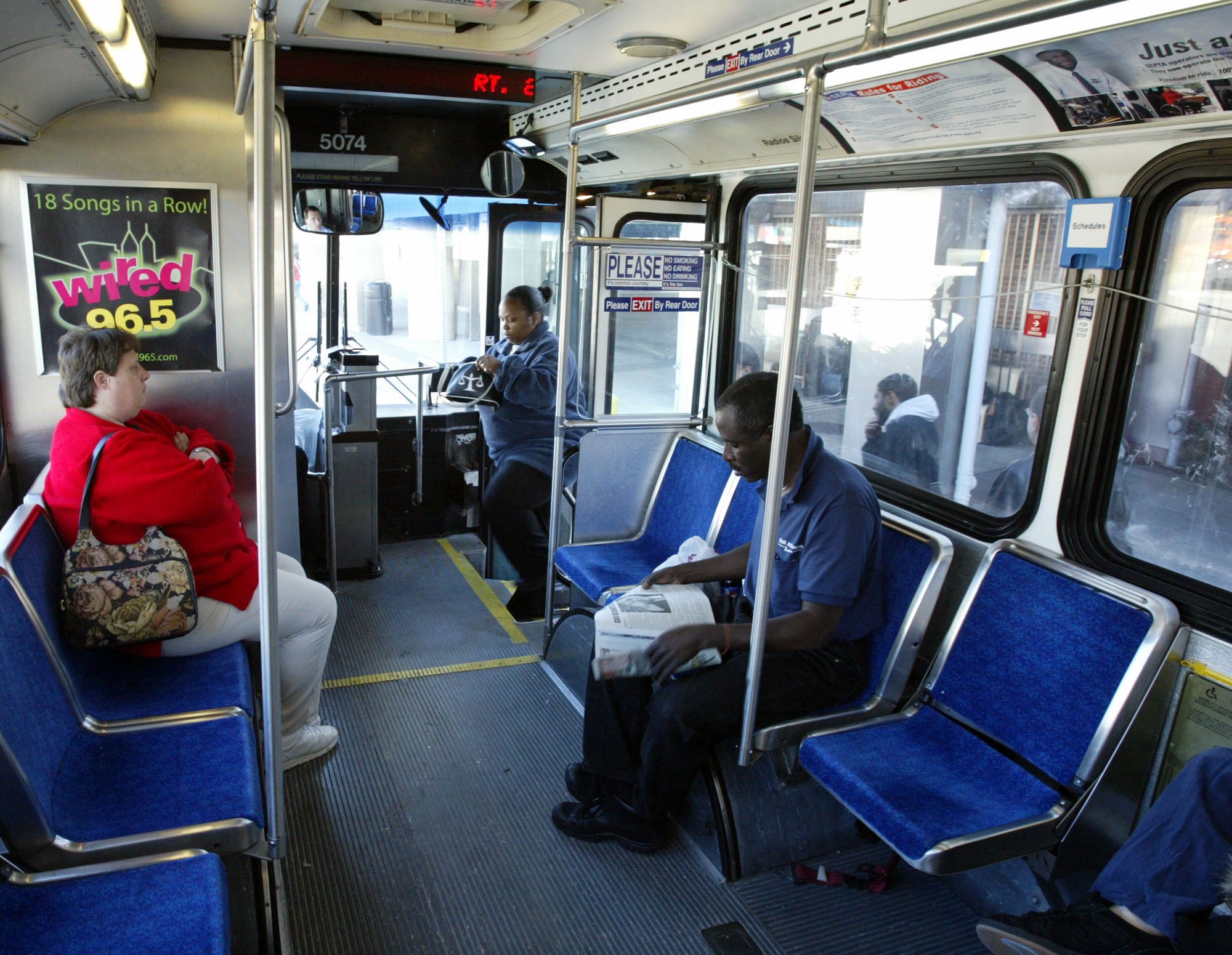  Commuters on board a Southeastern Pennsylvania Transportation Authority (SEPTA) bus,  (AP Photo/Joseph Kaczmarek) 