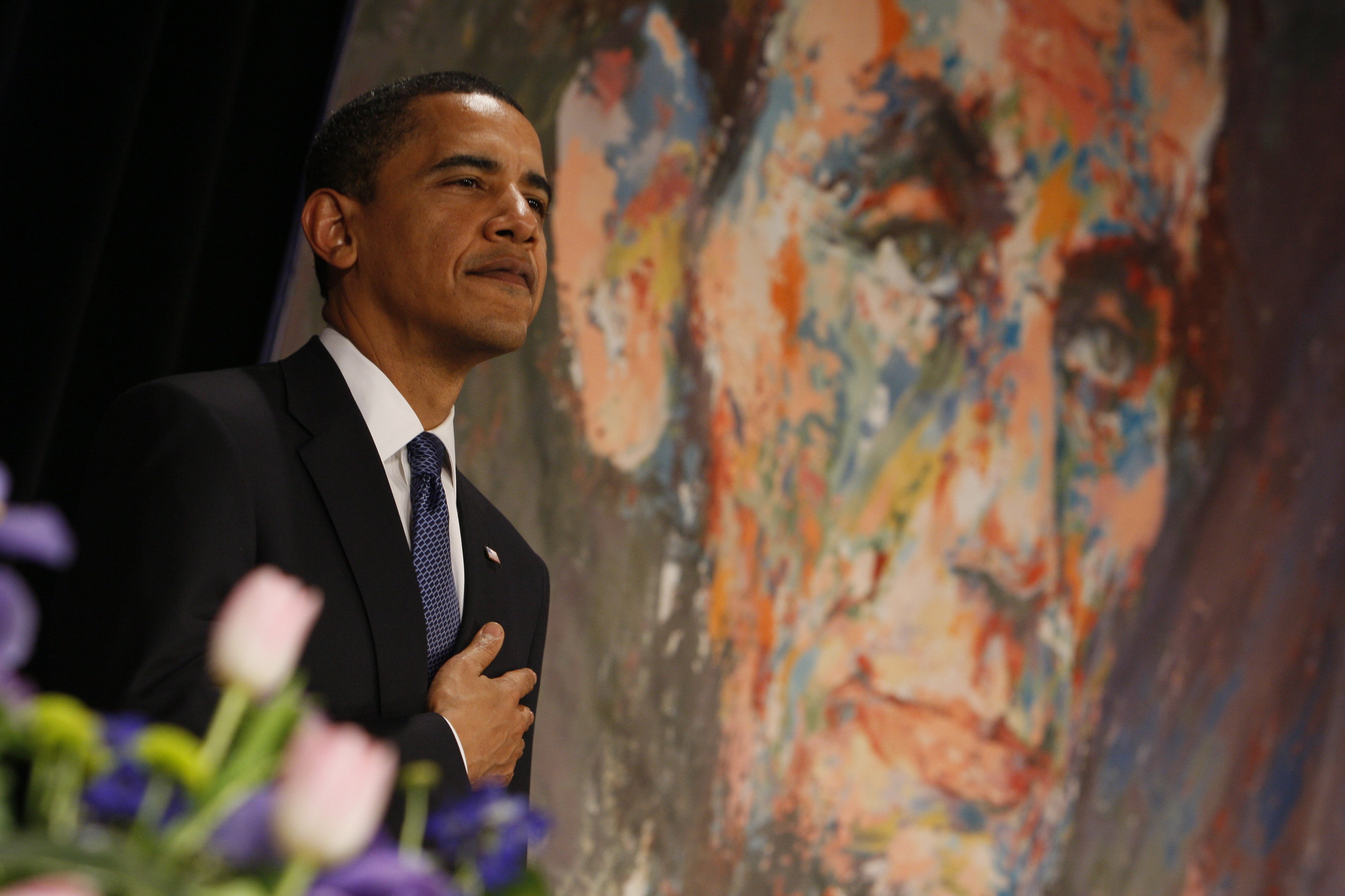  President Obama puts his hand to his heart during the Pledge of Allegiance at the 102nd Abraham Lincoln Association banquet in Springfield, Ill., in 2009. (AP Photo/Charles Dharapak) 