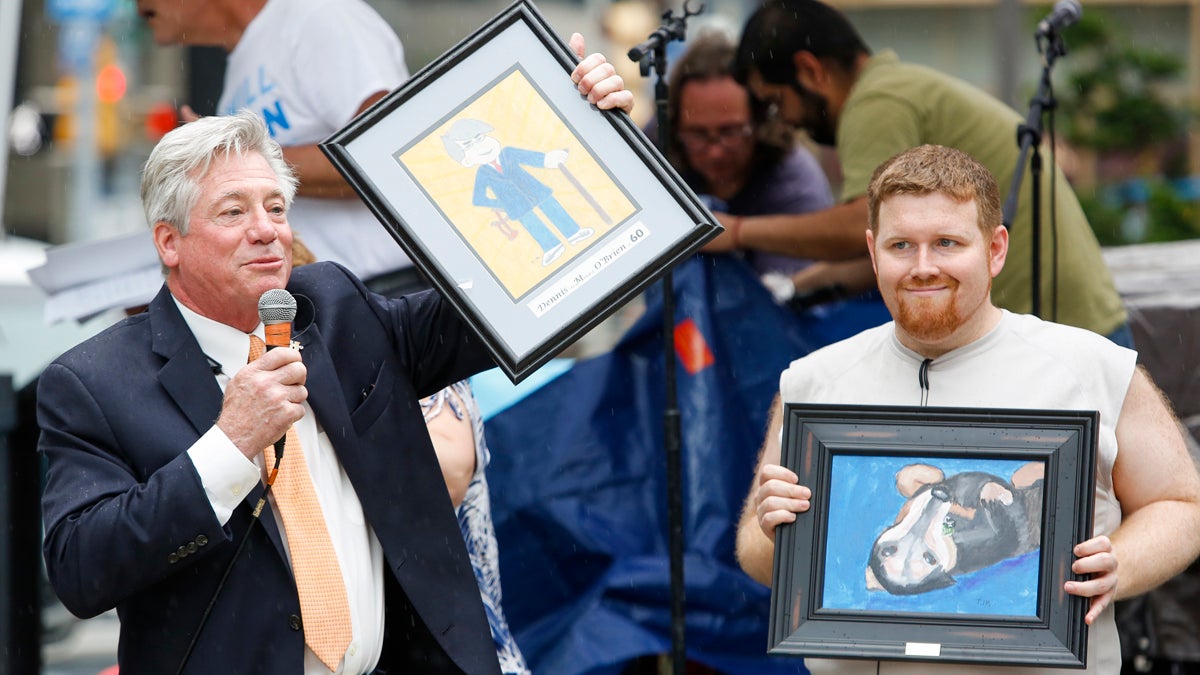  Philadelphia City Councilman Dennis O'Brien, left, and Timmy McCullough, who has battled mental illness, speak at #IWillListen Day in LOVE Park in Philadelphia Tuesday, June 3, 2014. (Mark Stehle/AP Images for NAMI-NYC) 