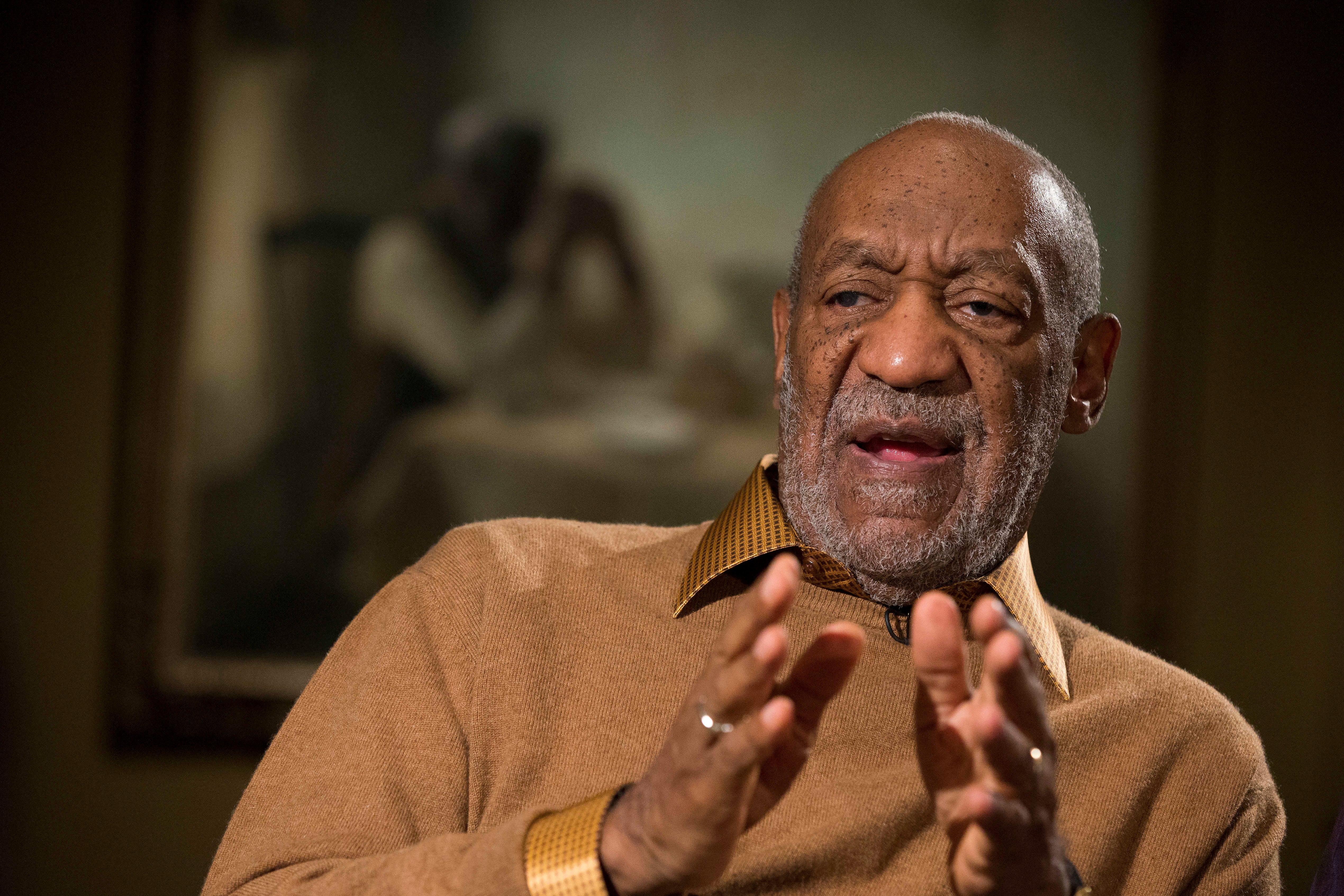  In this Nov. 6, 2014 file photo, Entertainer Bill Cosby gestures during an interview about the upcoming exhibit, Conversations: African and African-American Artworks in Dialogue, at the Smithsonian's National Museum of African Art, in Washington. (AP Photo/Evan Vucci) 