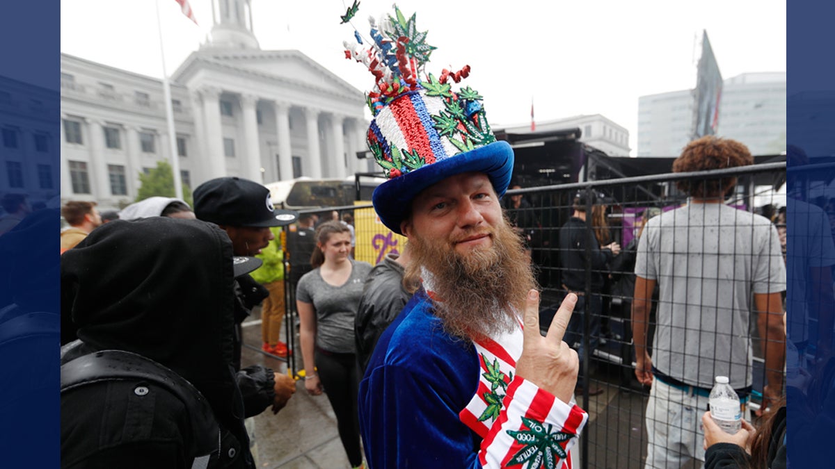  Marijuana enthusiast flashes a peace sign as he waits to go on the stage light up at the 4/20 holiday on Thursday, April 20, 2017, in Denver's Civic Center Park. The annual celebration of cannabis culture attracted users from across the intermountain West to Denver.  (David Zalubowski/AP Photo) 