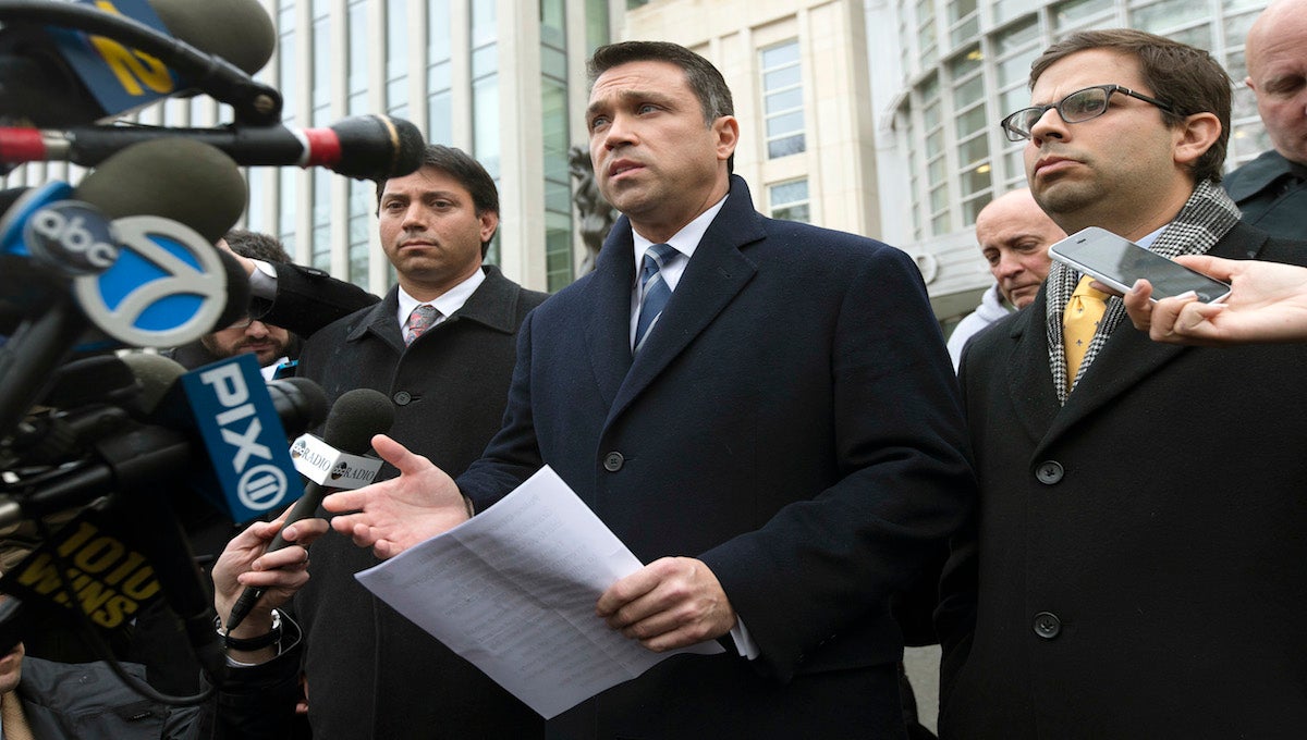  Rep. Michael Grimm speaks to the media outside Federal court in Brooklyn after pleading guilty to a federal tax evasion charge on Tuesday. / AP Photo/John Minchillo 
