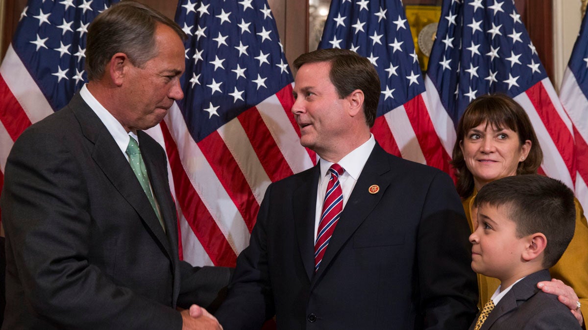  Speaker of the House Rep. John Boehner, R-Ohio, left, shakes hands with U.S. Rep. Donald Norcross, D-N.J., center, during a ceremonial swearing-in ceremony on Capitol Hill in November.  (AP Photo/Evan Vucci) 