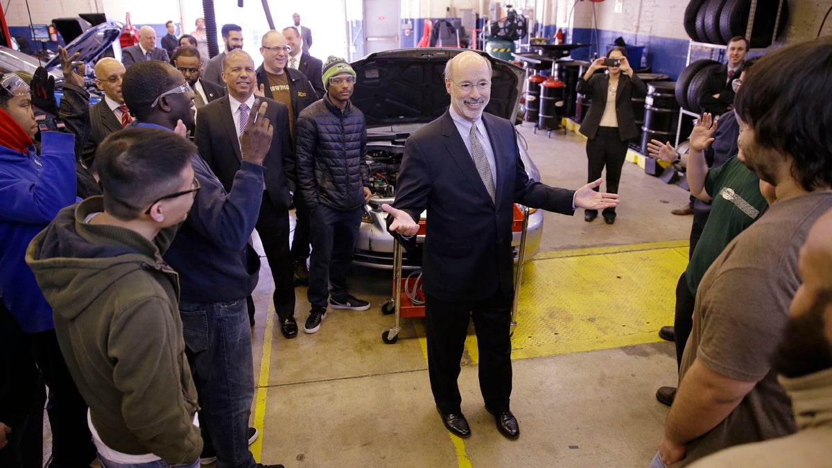  Gov. Tom Wolf visits Professor Dan Reed's automotive service technology class at the Community College of Philadelphia. The governor's budget talks with the Republican-controlled Legislature may stall before they start.(AP Photo/Matt Rourke) 