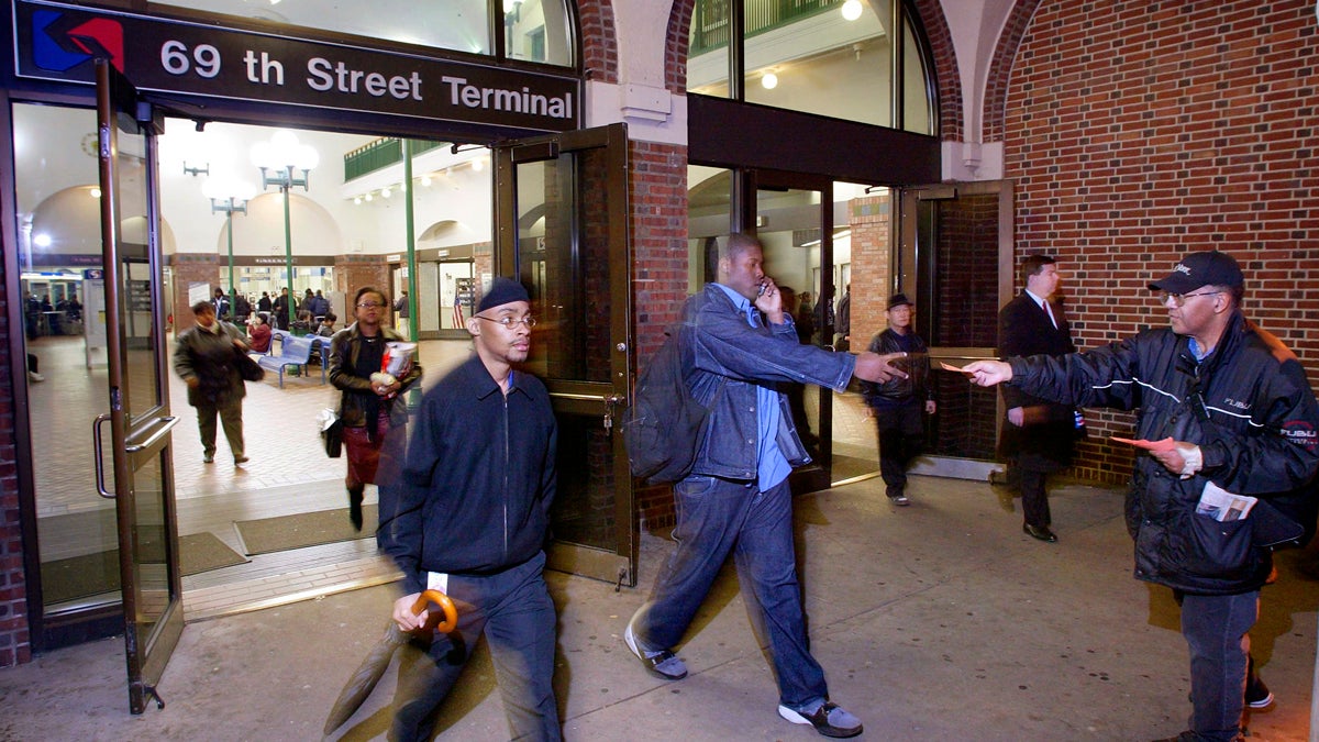  Commuters exit SEPTA's 69th Street terminal (George Widman/AP Photo) 