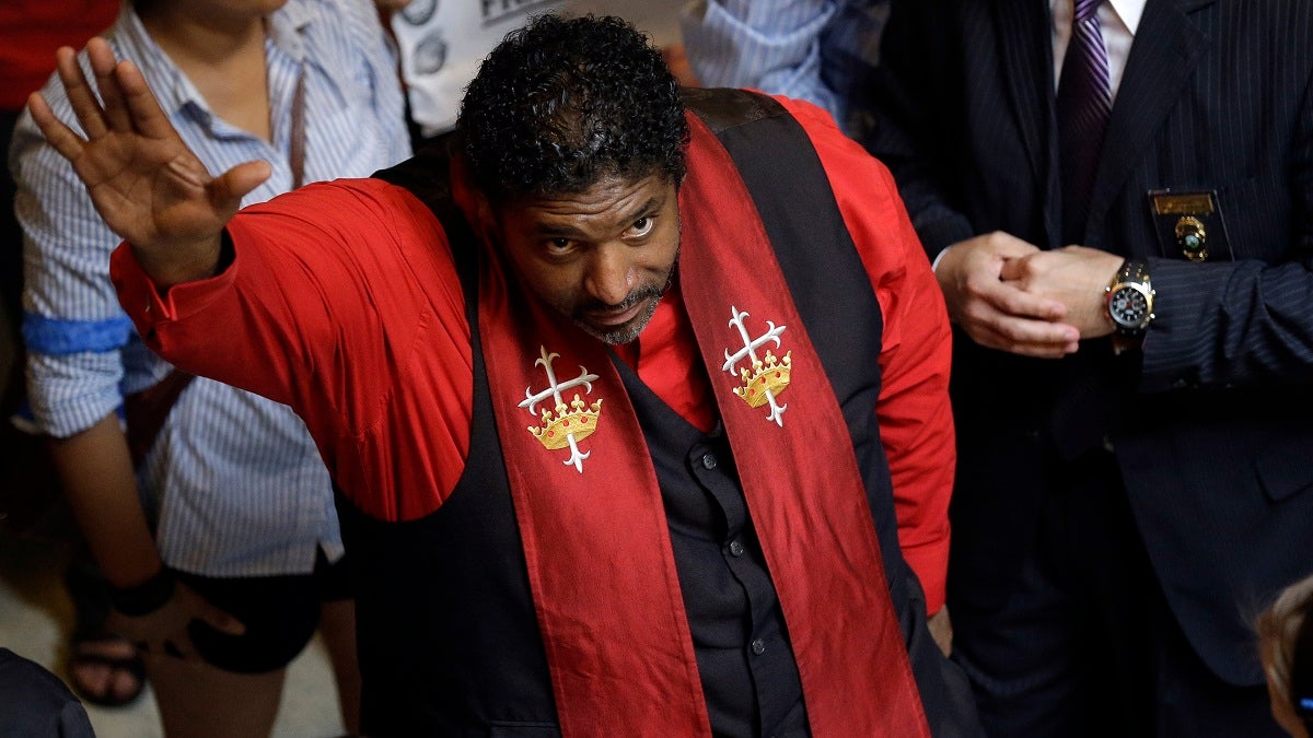  Rev. William Barber, president of the N.C. chapter of the NAACP speaks to supporters at the state legislature in Raleigh, N.C., Monday. Supporters of what the group calls 