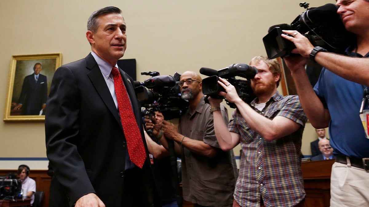  House Oversight and Government Reform Committee Chairman Rep. Darrell Issa, R-Calif., walks to the dais on Capitol Hill in Washington, Thursday, June 6, 2013, after greeting witnesses before the committee's hearing regarding IRS conference spending. (AP Photo/Charles Dharapak) 