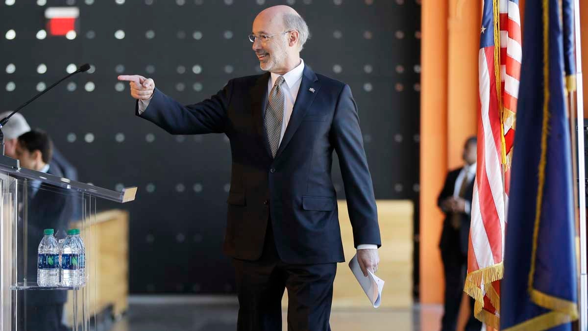  Gov. Tom Wolf walks to the podium to speak to a business group about his upcoming budget at the MusikFest Café in Bethlehem, Pennsylvania. Wolf will seek to cut the commonwealth's major corporate income tax rate in half, but also try to broaden how it is applied. (AP Photo/Matt Rourke) 