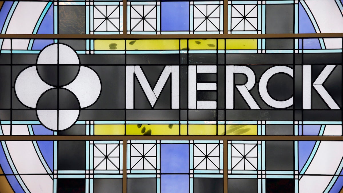  This Thursday, Dec. 18, 2014, file photo shows the Merck logo on a stained glass panel at a Merck company building in Kenilworth, N.J. (AP Photo/Mel Evans, File) 