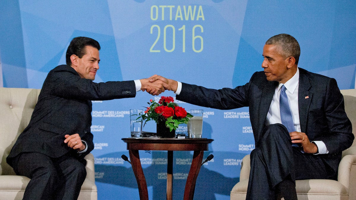   In this Wednesday, June 29, 2016 file photo, President Barack Obama shakes hands with Mexican President Enrique Pena Neito during their bilateral meeting at the National Gallery of Canada in Ottawa, Canada. (AP Photo/Pablo Martinez Monsivais, File) 