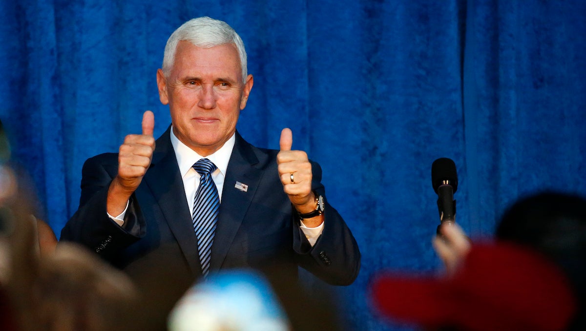 Republican vice presidential candidate Indiana Gov. Mike Pence arrives at a campaign rally