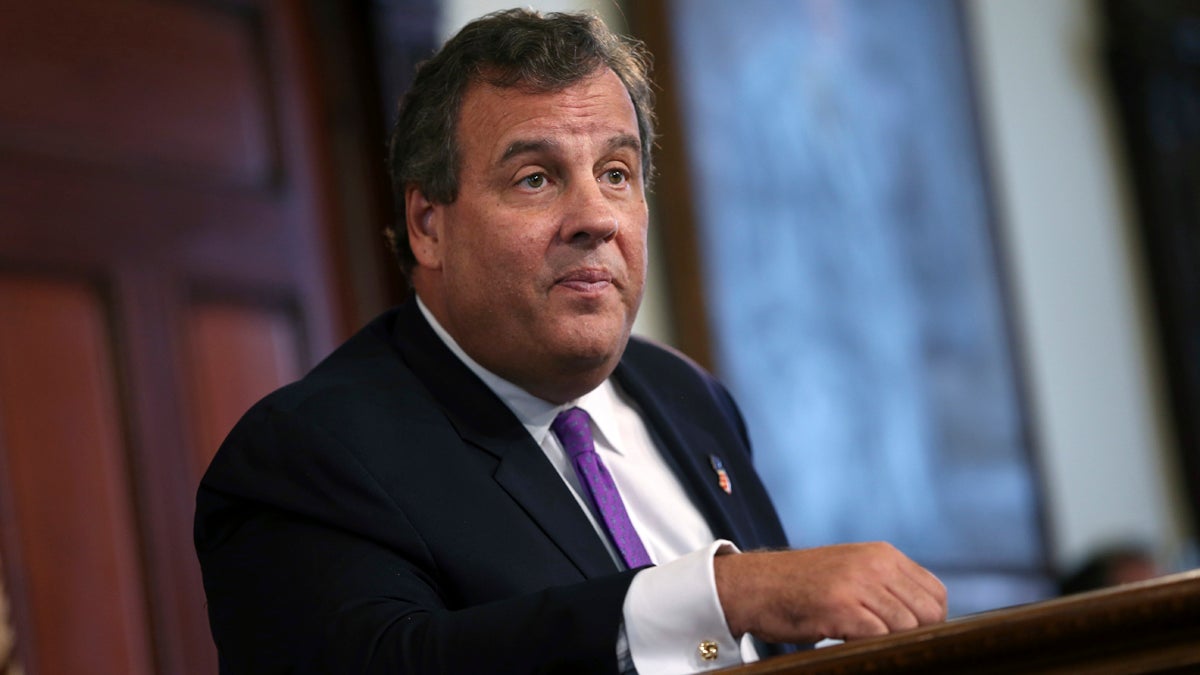 Gov. Chris Christie listens to a question after announcing Monday that more than 500