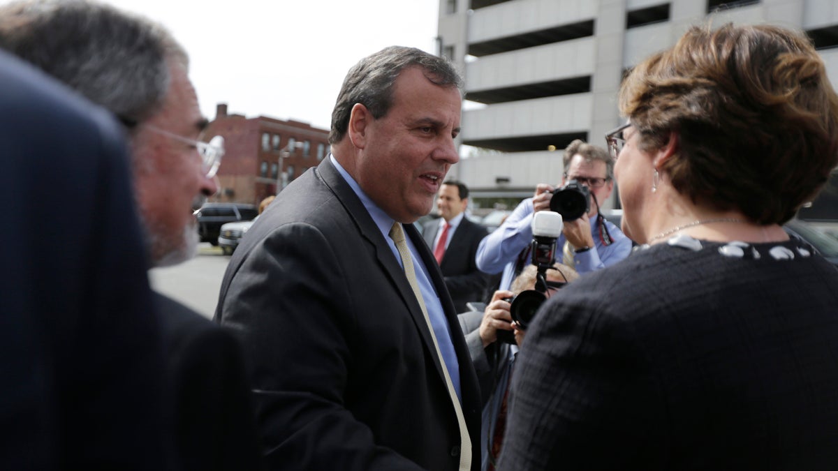New Jersey Gov. Chris Christie is greeted as he arrives at University Hospital for the grand opening of the Rutgers Cancer Institute of New Jersey Tuesday. He did not answer questions about revelations at the Bridgegate trial. (AP Photo/Julio Cortez)