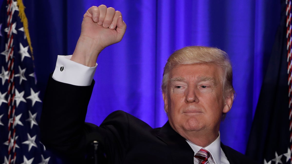 President Donald Trump gestures while speaking at the Republican congressional retreat in Philadelphia