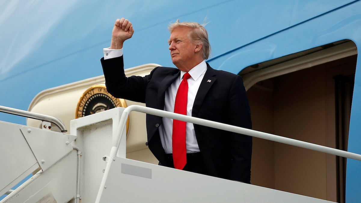  President Donald Trump gestures as he steps off Air Force One at the Palm Beach International Airport, Friday, March 3, 2017, in West Palm Beach, Fla. (AP Photo/Alex Brandon) 