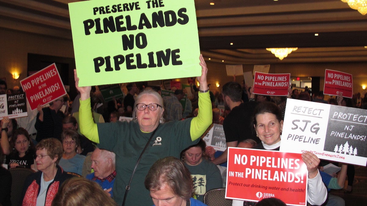  In this Feb. 24, 2017, photo, opponents of a natural gas pipeline planned to run through the ecologically sensitive Pinelands region of New Jersey protest at a meeting of the New Jersey Pinelands Commission at which the project was improved in Atlantic City, N.J. On Monday, April 10, 2017, the New Jersey Sierra Club appealed the decision, claiming the commission did not follow its own rules in approving the project. (AP Photo/Wayne Parry) 