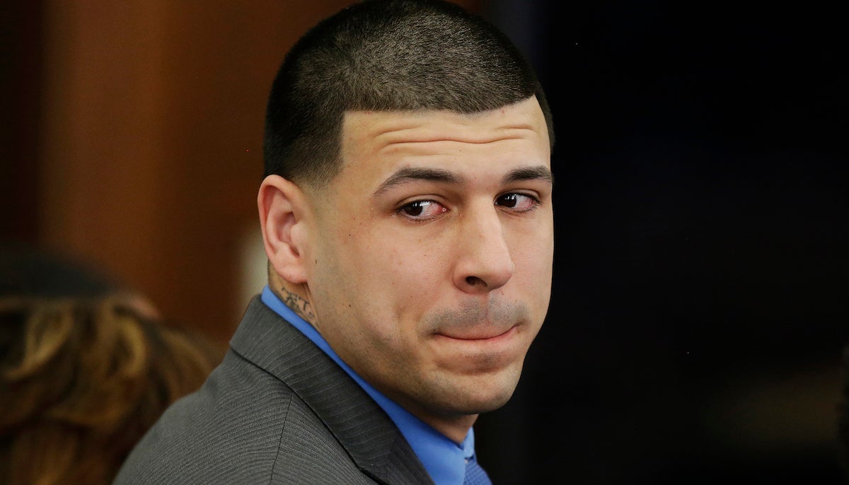  FILE - In this Friday, April 14, 2017, file photo, Former New England Patriots tight end Aaron Hernandez turns to look in the direction of the jury as he reacts to his double murder acquittal at Suffolk Superior Court in Boston. Hernandez hung himself and was pronounced dead at a Massachusetts hospital early Wednesday, April 19, 2017, according to officials. (AP Photo/Stephan Savoia, Pool, File) 