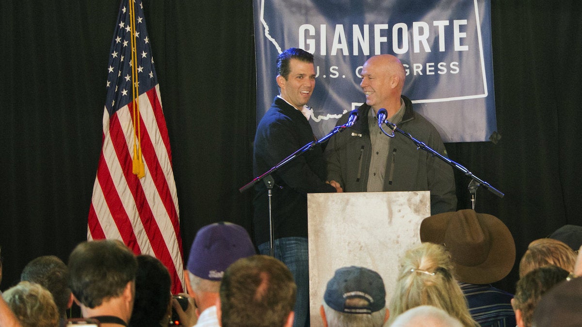 Republican Greg Gianforte (right) welcomes Donald Trump Jr., the president's son, onto the stage at a rally in East Helena, Mont., on May 11. Gianforte, a businessman, is embracing his party's president in his race for the state's open congressional seat.(Bobby Caina Calvan/AP) 