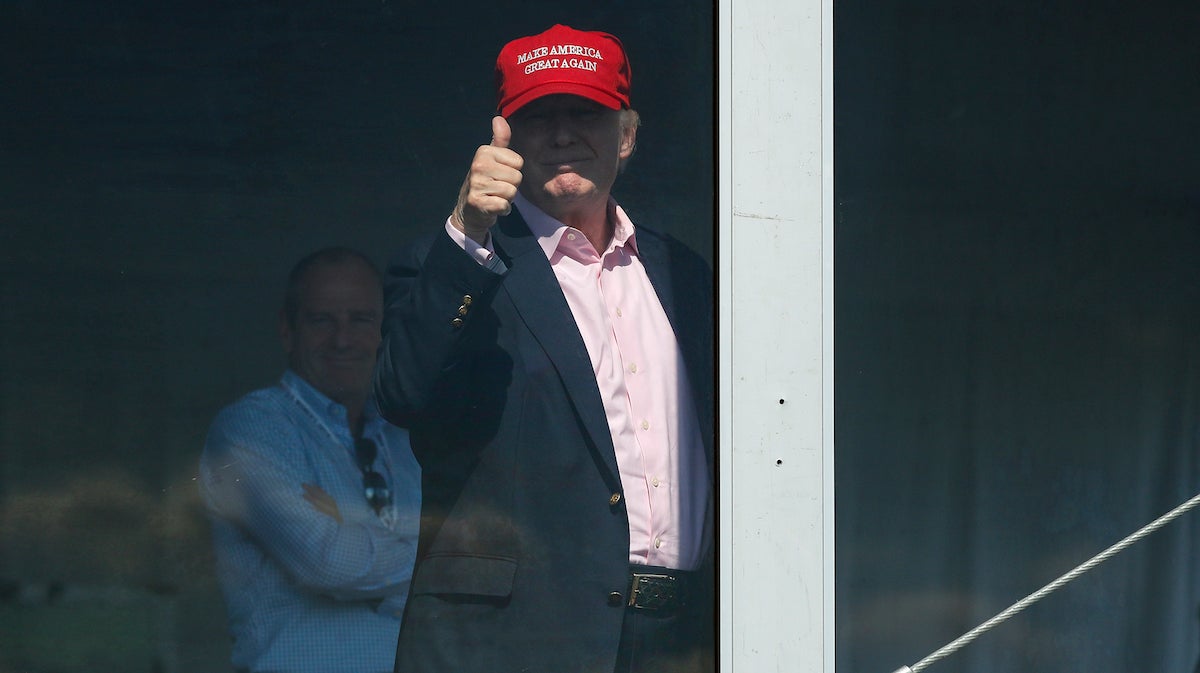  President Donald Trump gives a thumbs-up from his presidential viewing stand, Sunday, July 16, 2017, during the U.S. Women's Open Golf tournament at Trump National Golf Club in Bedminster, N.J. (AP Photo/Carolyn Kaster) 