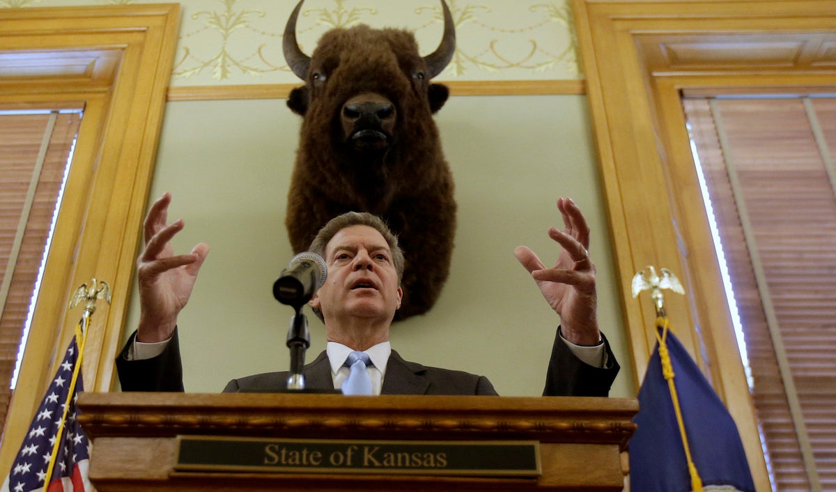  Kansas Gov. Sam Brownback talks to the media during a news conference Thursday, July 27, 2017, in Topeka, Kan. President Donald Trump on Wednesday nominated Brownback to be ambassador-at-large for international religious freedom. (AP Photo/Charlie Riedel) 