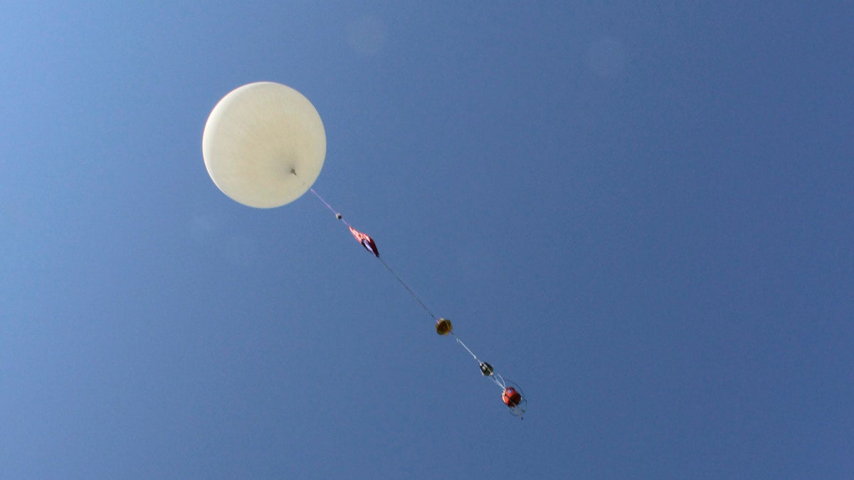  An 8-foot camera-carrying balloon has a test launch before Monday's solar eclipse. (AP Photo/Pat Eaton-Robb) 