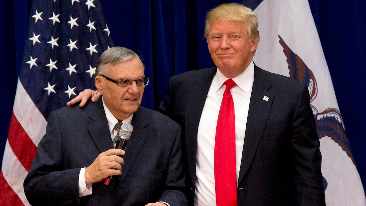  In this Jan. 26, 2016, photo, Republican presidential candidate Donald Trump is joined by Maricopa County, Ariz., Sheriff Joe Arpaio at a campaign event in Marshalltown, Iowa. (AP Photo/Mary Altaffer, File) 