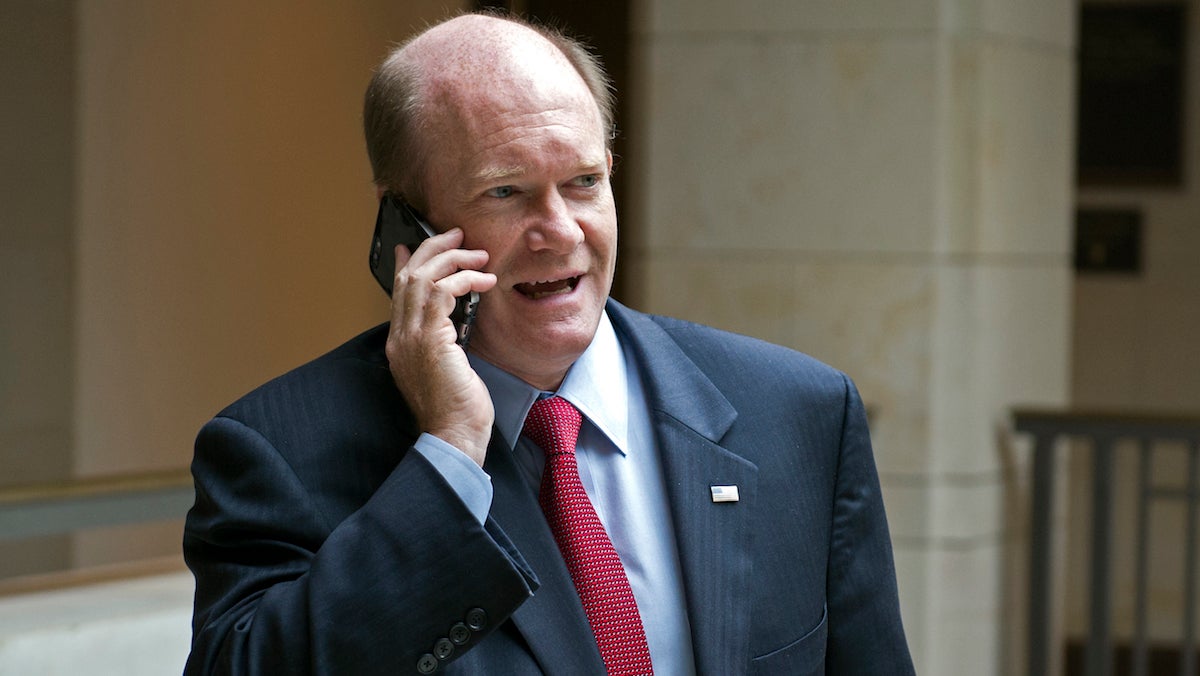  Sen. Chris Coons, D-Del., talks on a phone in Washington, Tuesday, Oct. 27, 2015. (AP Photo/Cliff Owen) 