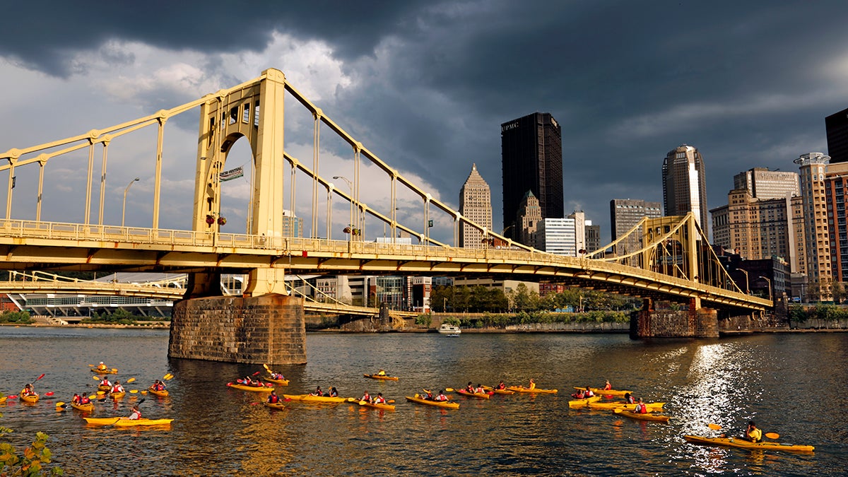 Kayakers paddle past downtown Pittsburgh on the Allegheny River in this September 4, 2015 photo. (AP File Photo/Gene J. Puskar) 